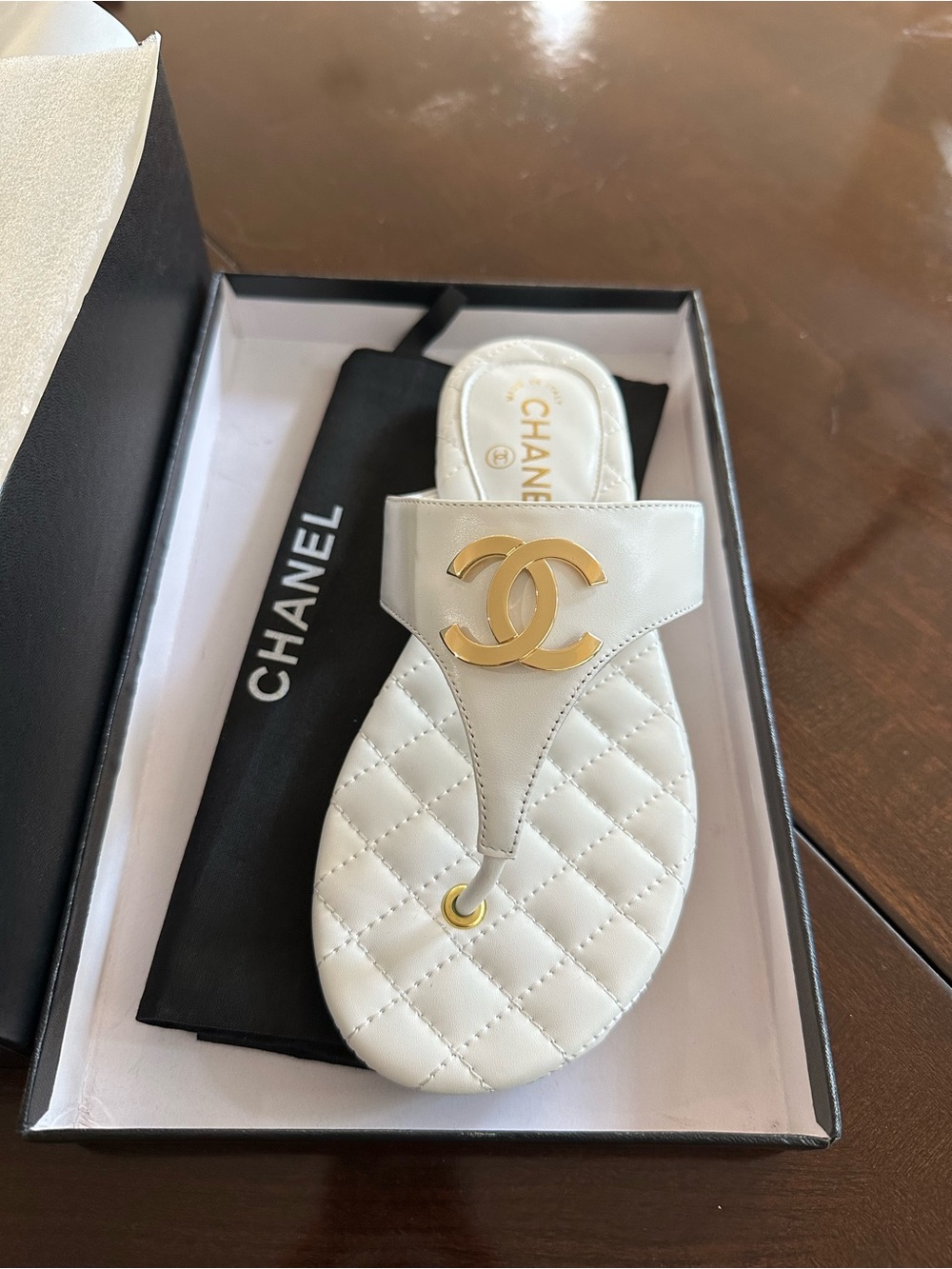 CHANEL White Quilted Leather Thong Sandal with Gold CC Accent